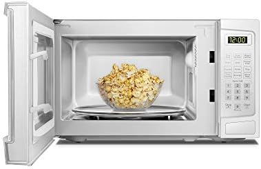 Danby DBMW1120BWW 1.1 Cu.Ft. Countertop Microwave In White - 1000 Watts, Family Size Microwave With Push Button Door